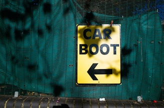 yellow car boot signage