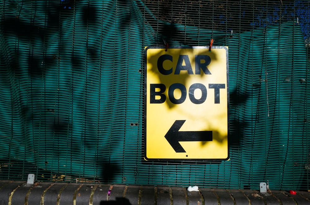 yellow car boot signage