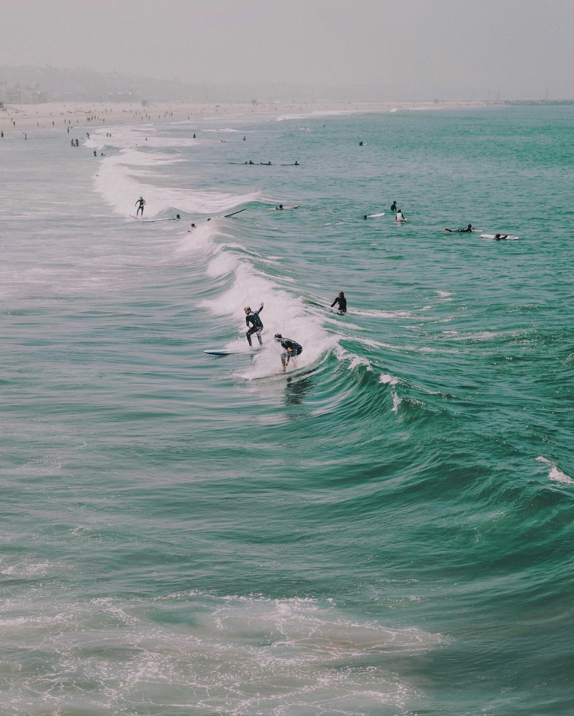 Walking around Venice Beach is electrifying, there is no other beach like it in the world. This partifular day was smoggy, but it didn’t stop the surfers from catching all the awesome waves.