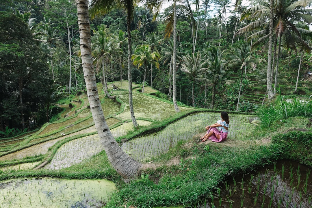 woman sitting on landscaped farm