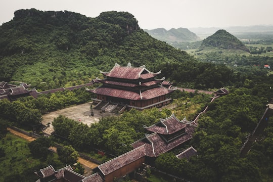 selective focus photography of brown house in Bai Dinh Pagoda Vietnam