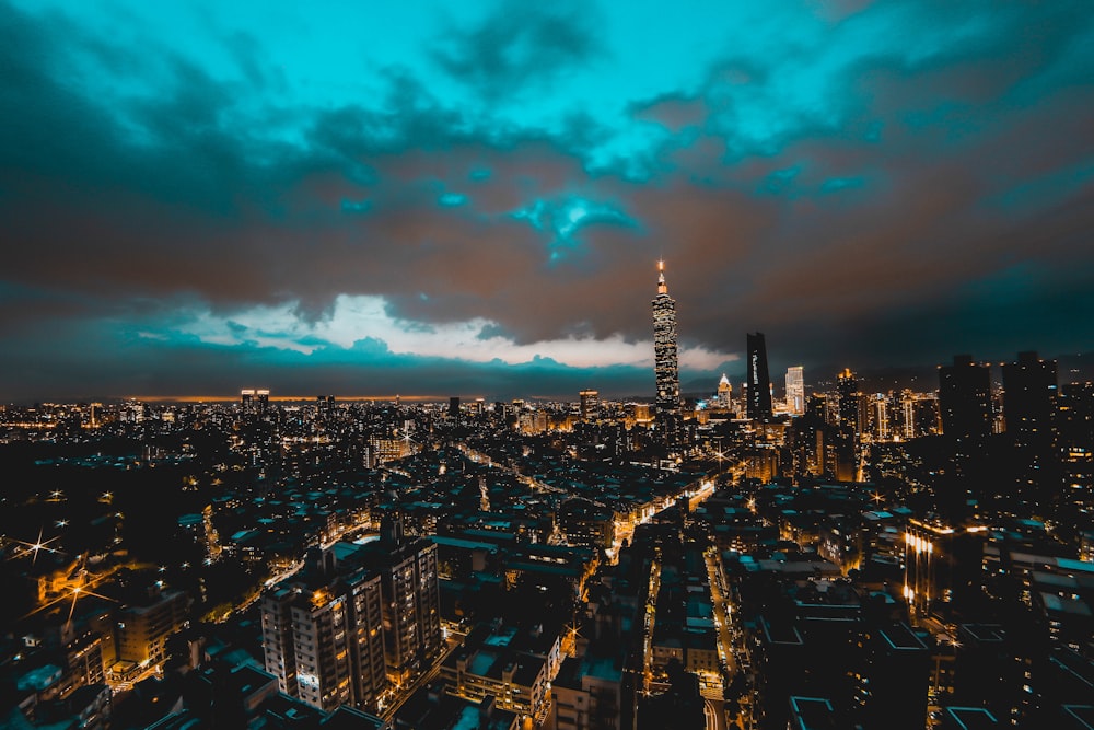 aerial view of city under blue sky