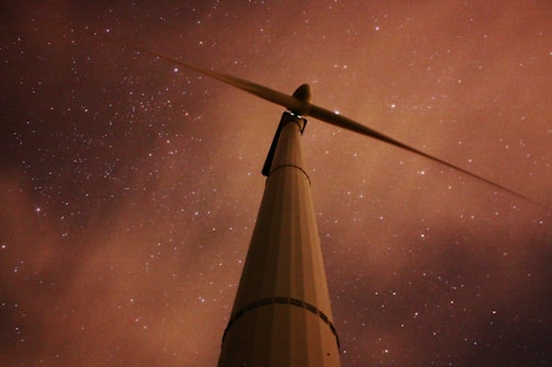 worm's eye view of wind turbine