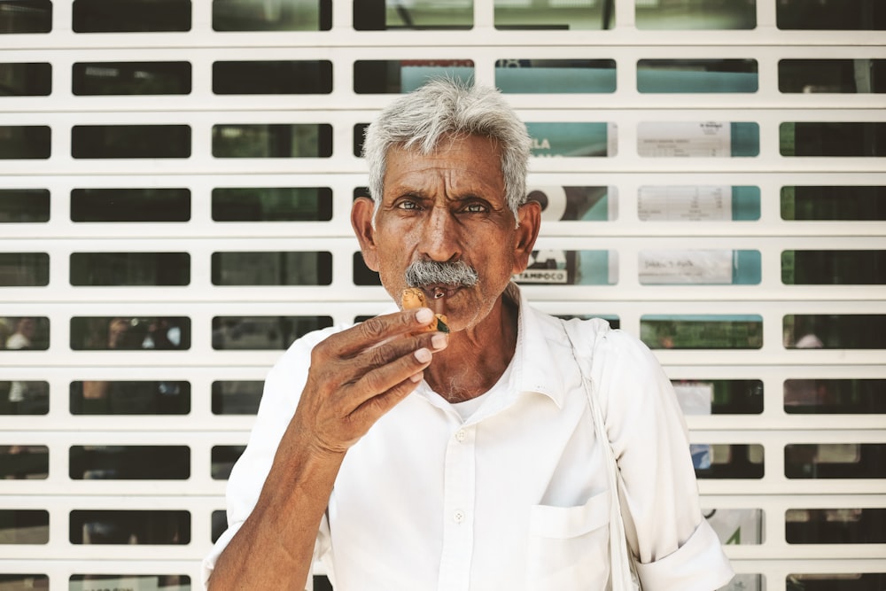 man touching his chin