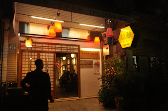 Evening exterior shot of Kumo Ramen at Kingsway Centre, softly lit with inviting Japanese-inspired elements.
