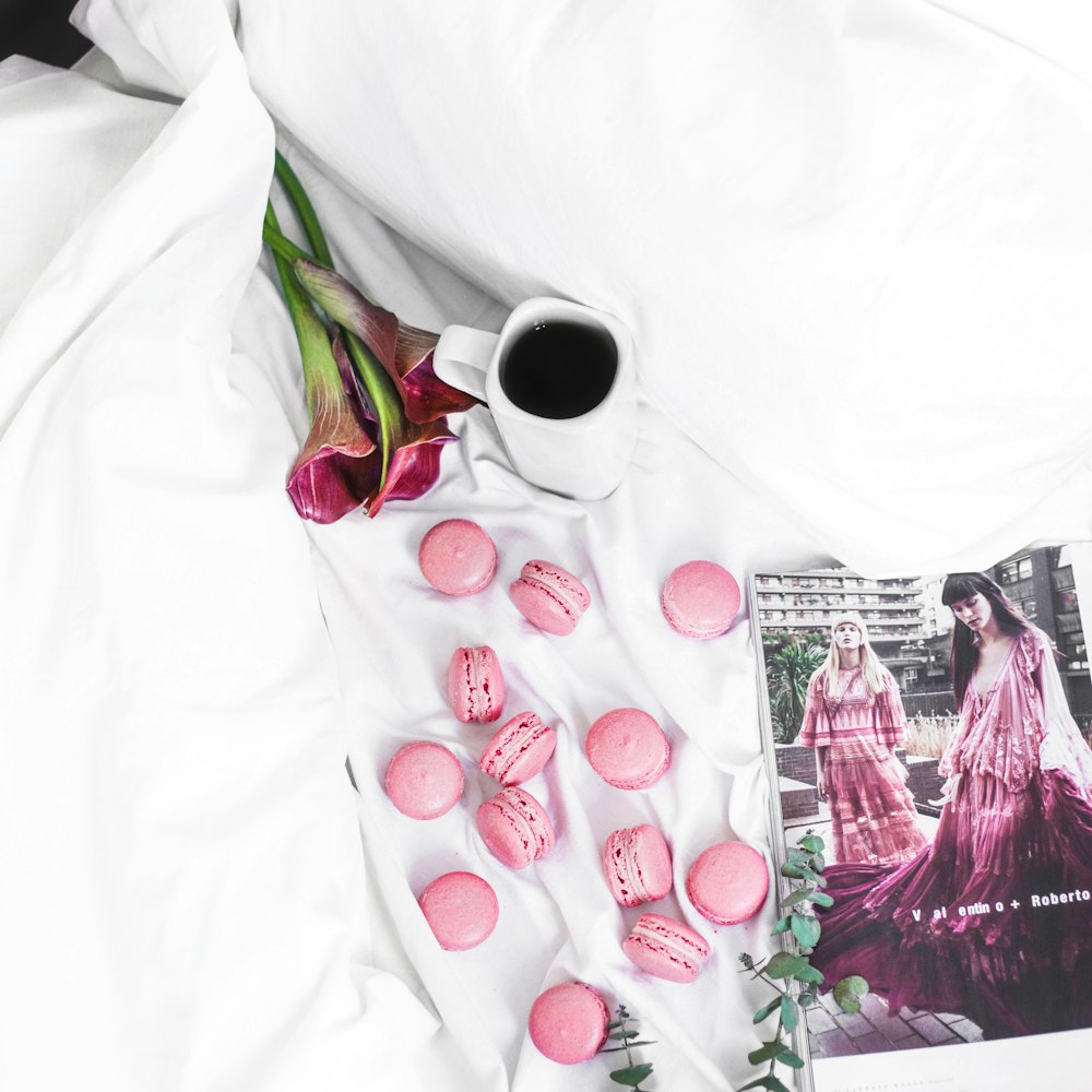 pink munchkins on white comforter