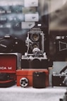 selective focus photography of black and gray twin-lens reflex camera