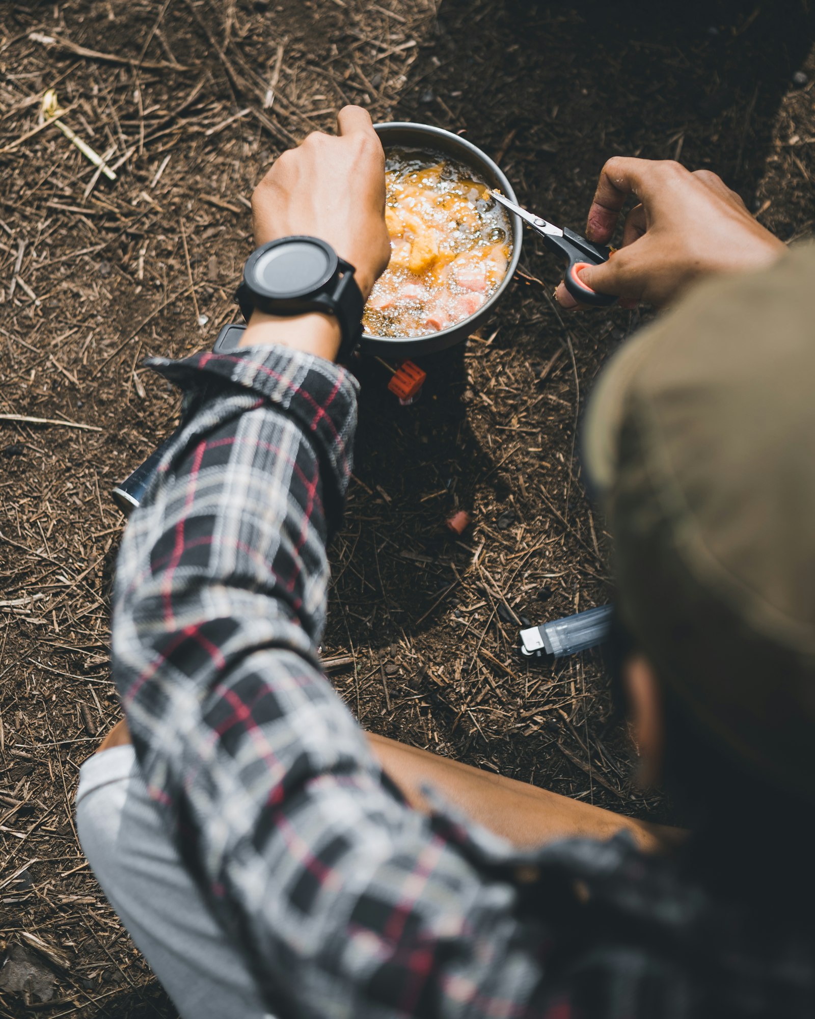 Sony a7S + Canon EF 50mm F1.8 II sample photo. Person cooking on stainless photography