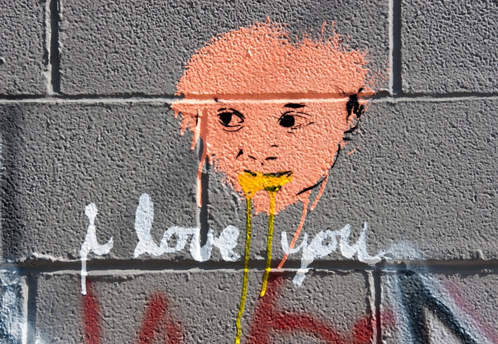 I Love You sign under face of man artwork