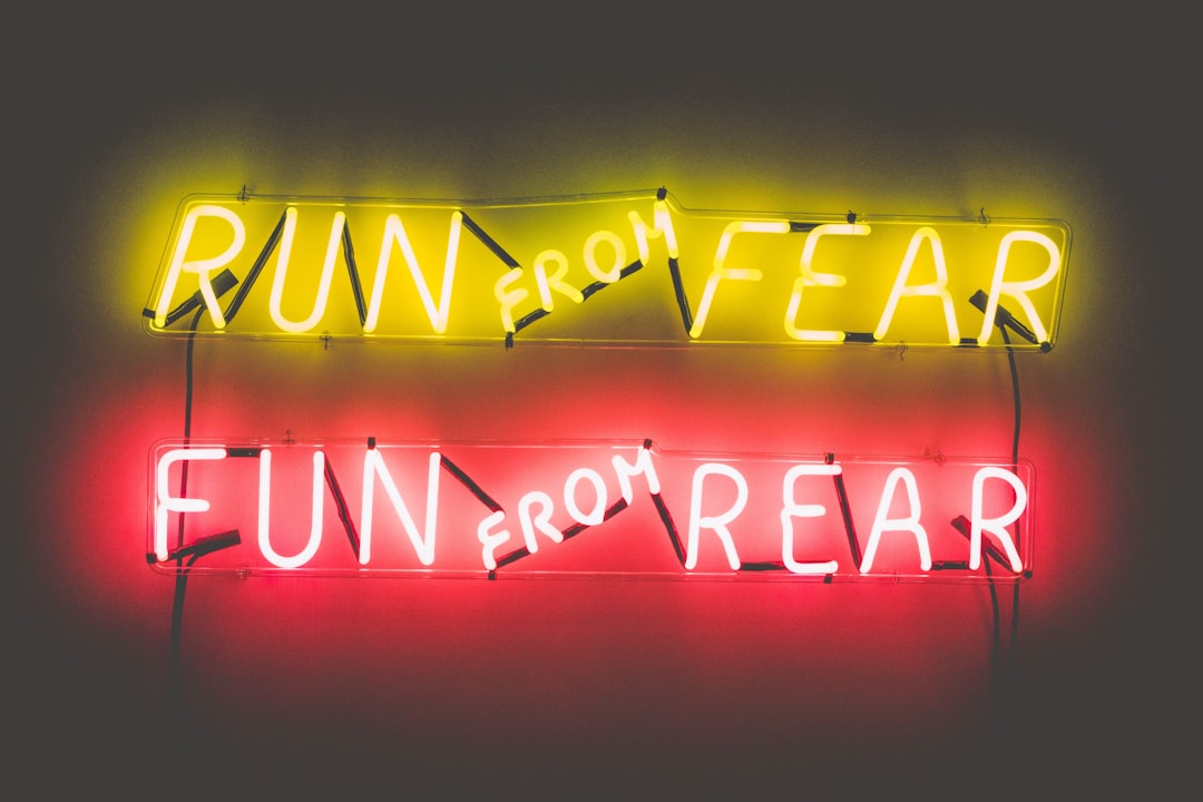 Run From Fear Fun From Rear lighted neon signage, Kinky