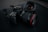 black Canon DSLR camera beside camera lens