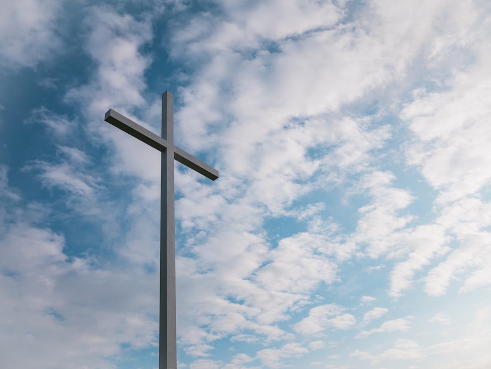 landscape shot of white cross during daytime