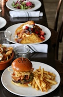 fried fries and burger on plate