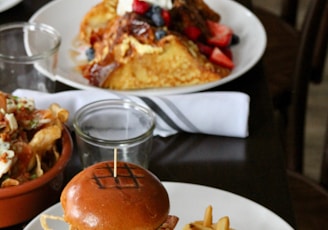 fried fries and burger on plate