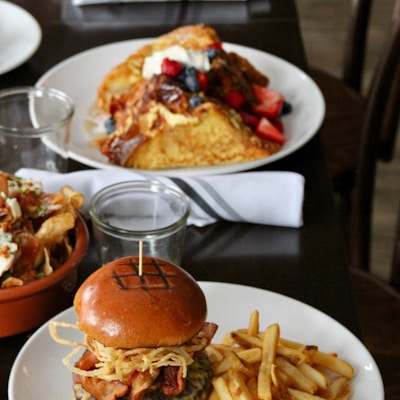 fried fries and burger on plate