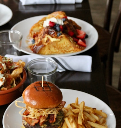 fried fries and burger on plate