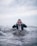 man on body of water during daytime