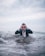 man on body of water during daytime