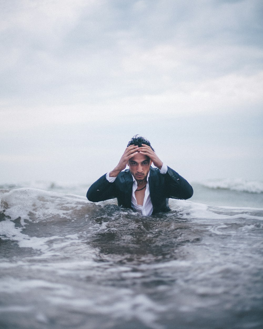 man on body of water during daytime