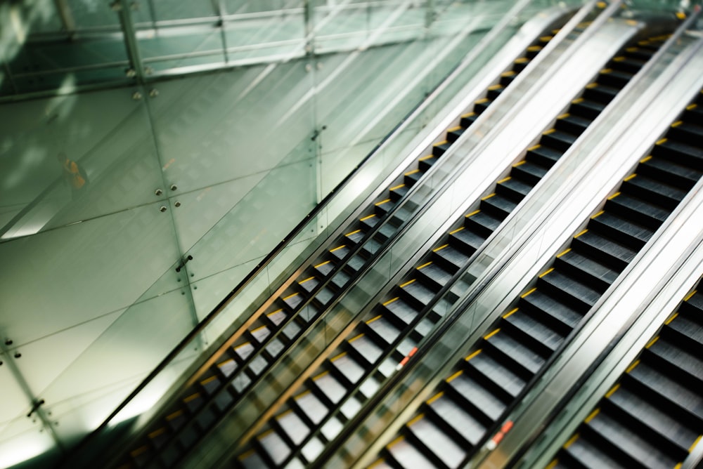 four black escalators