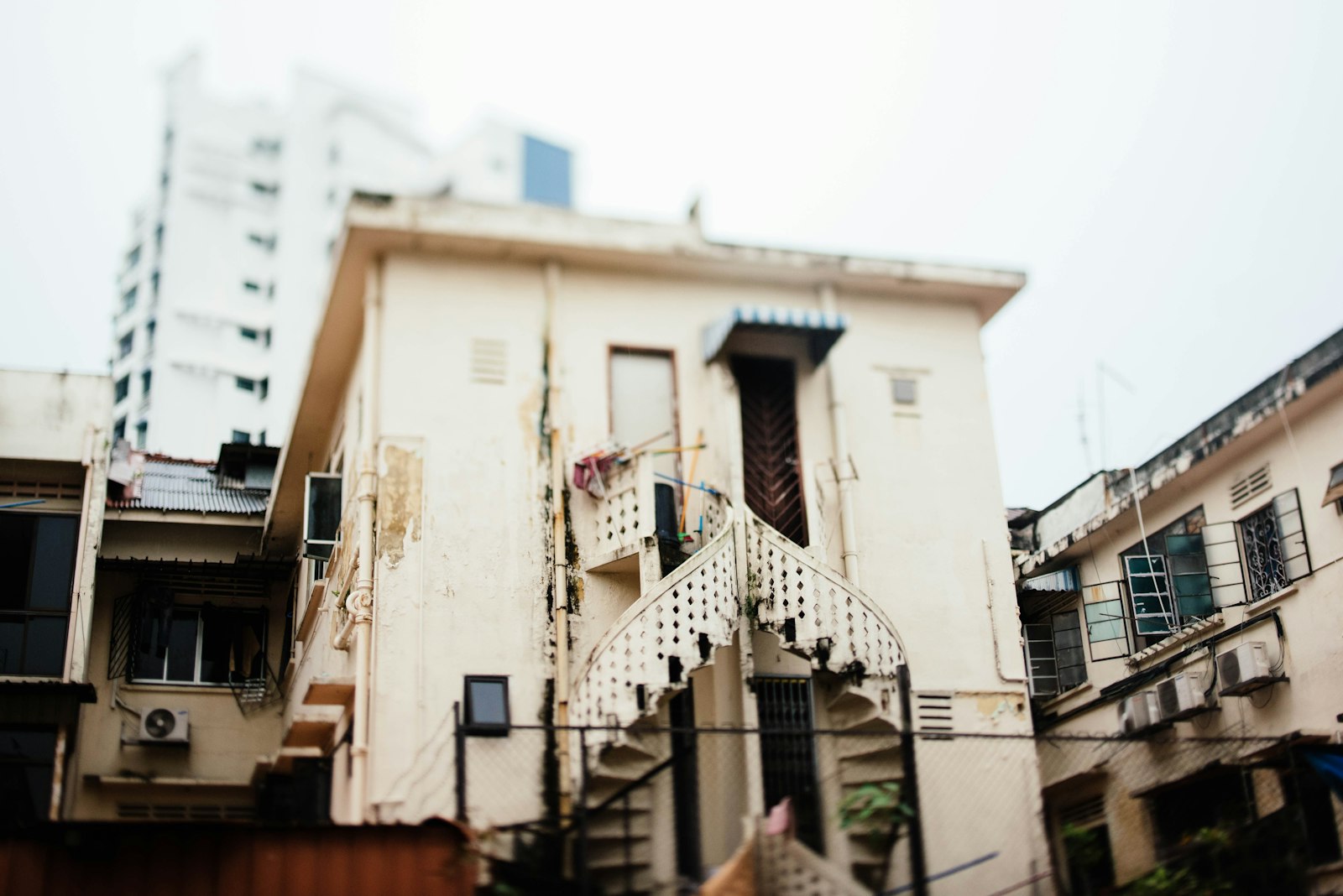 Nikon PC-E Nikkor 45mm F2.8D ED Tilt-Shift sample photo. Spiral stair beside white photography