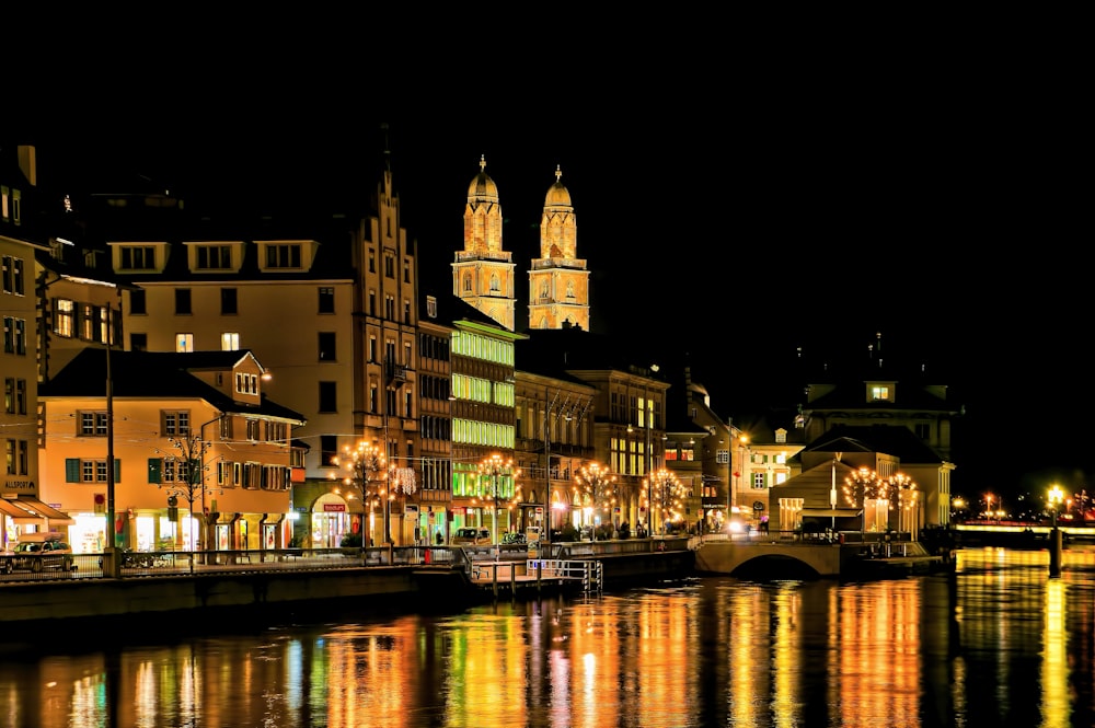 building beside body of water during night