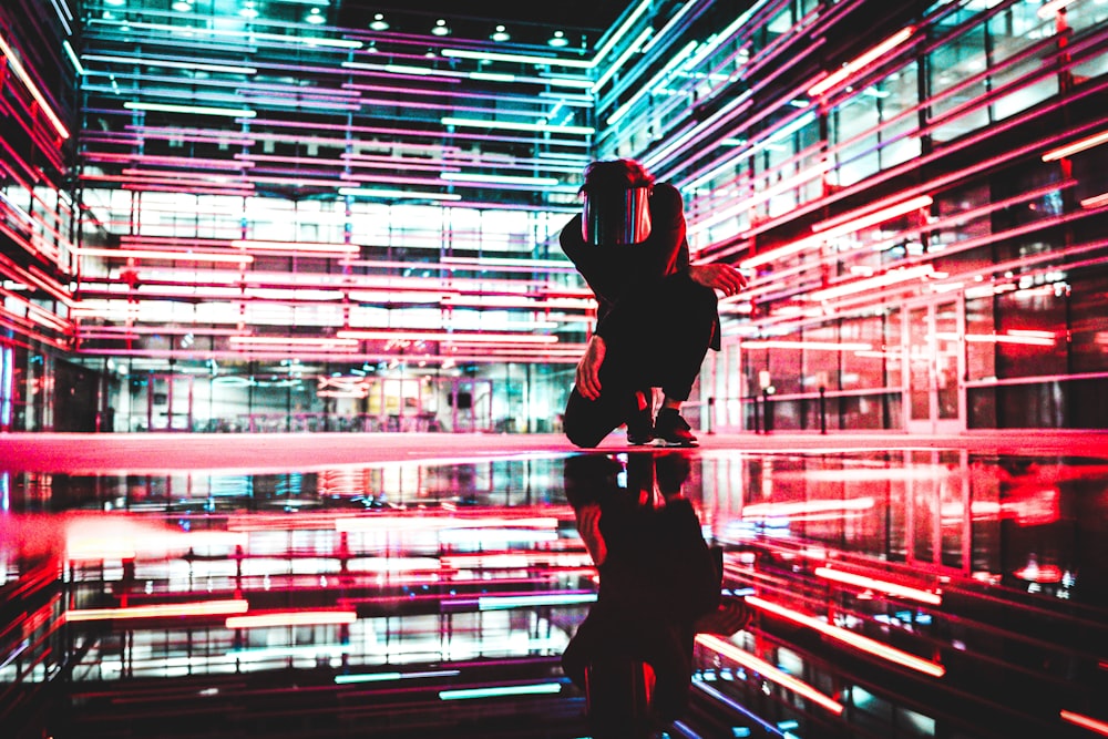 person kneeling inside building