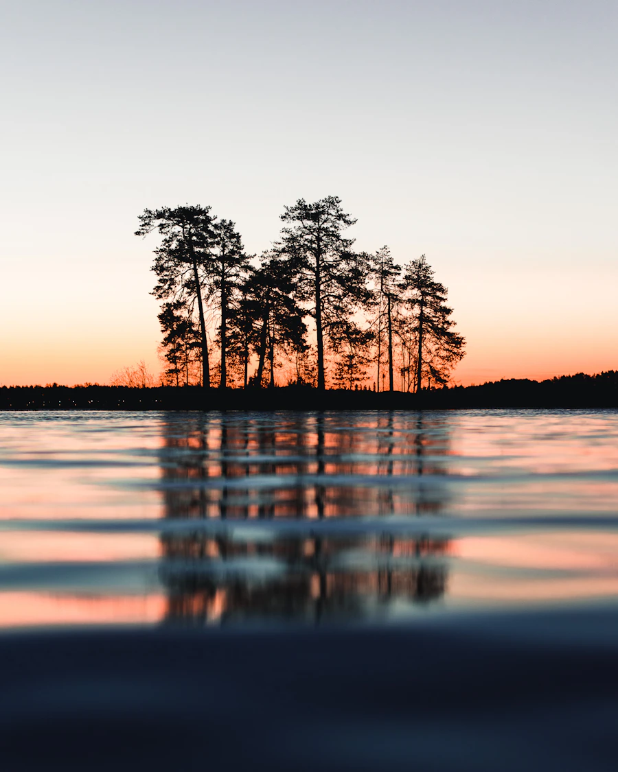 Lake and island silhouettes at sunset near Kuopio