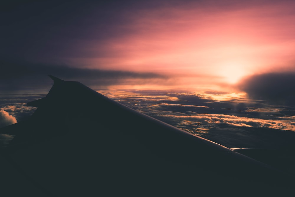 airplane silhouette during sunset