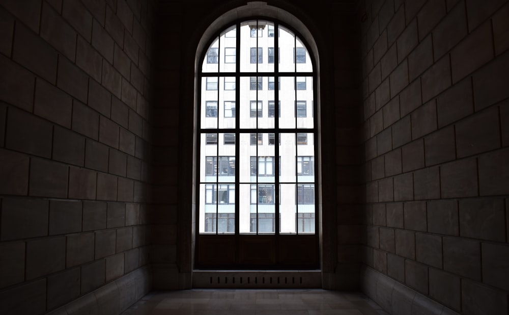 brown wooden framed glass window