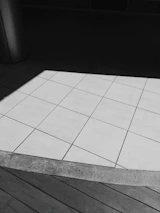 Before and after shots of a stunning floor renovation showcasing transformation.