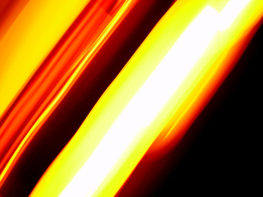 a close up of a red and yellow object