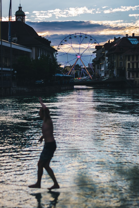 man walking on rope in Thun Switzerland