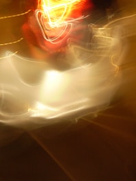 Abstract waves of light and sound blending in a harmonious flow.