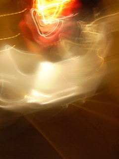 An abstract representation of energy flow in warm colors.