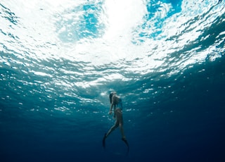 woman swimming underwater