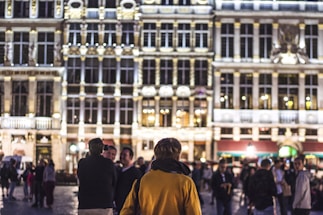 A diverse group of citizens gathered in a lively town square, engaging in conversation.