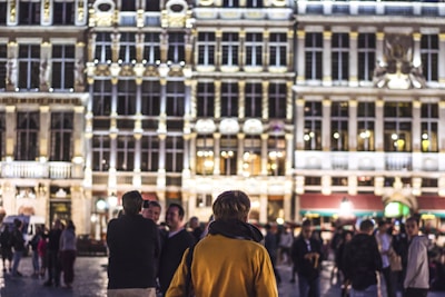 A lively village meeting in the town square with residents engaged in discussion