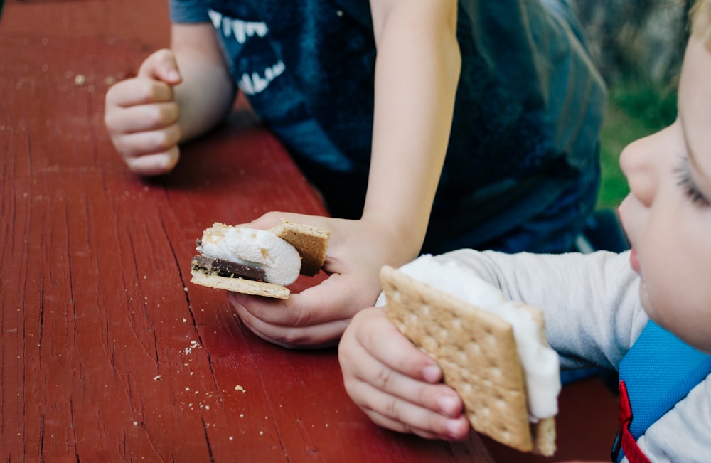 toddler holding cookie