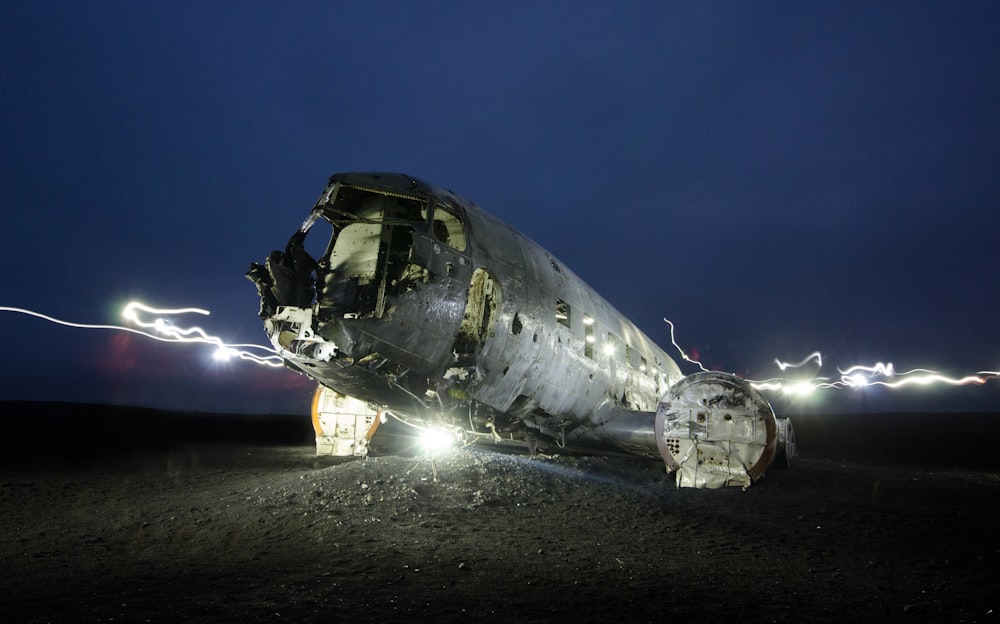 crashed airplane on brown soil