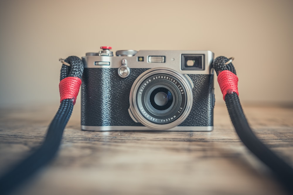 selective focus photography of black and gray bridge camera