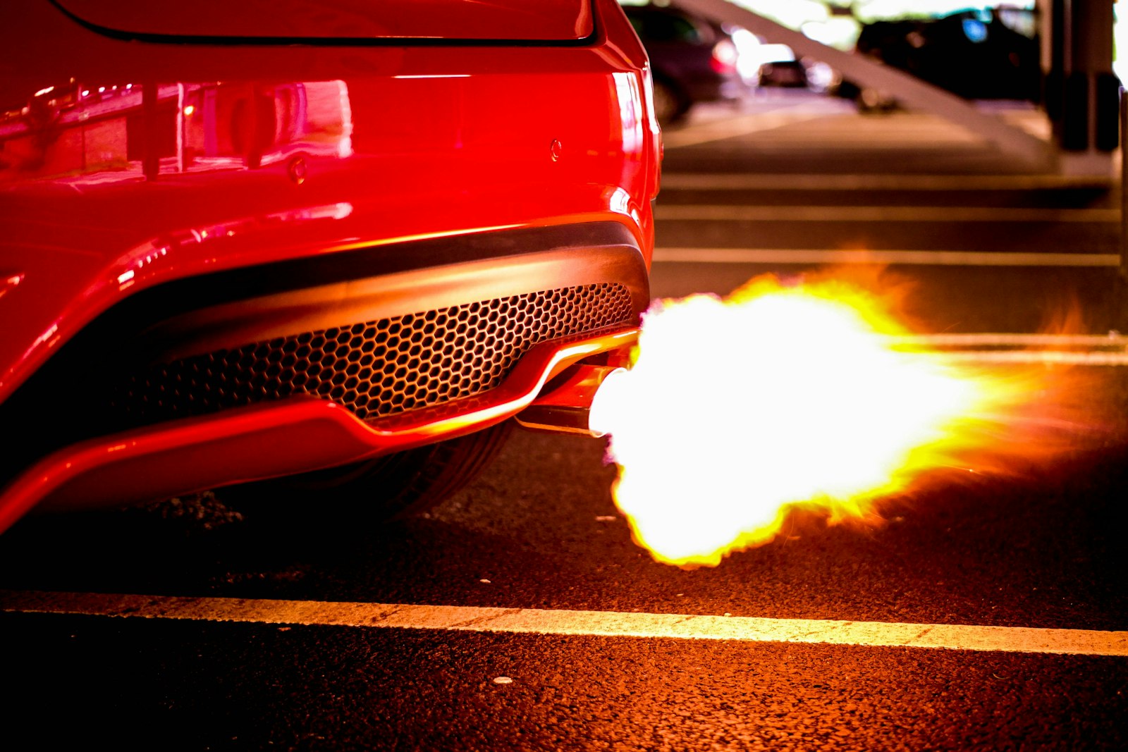 Samsung NX30 sample photo. Red car blowing turbo photography