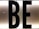 Black capital letters 'B' and 'E' against a bright, white illuminated background, possibly part of a sign or display board.