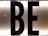Black capital letters 'B' and 'E' against a bright, white illuminated background, possibly part of a sign or display board.