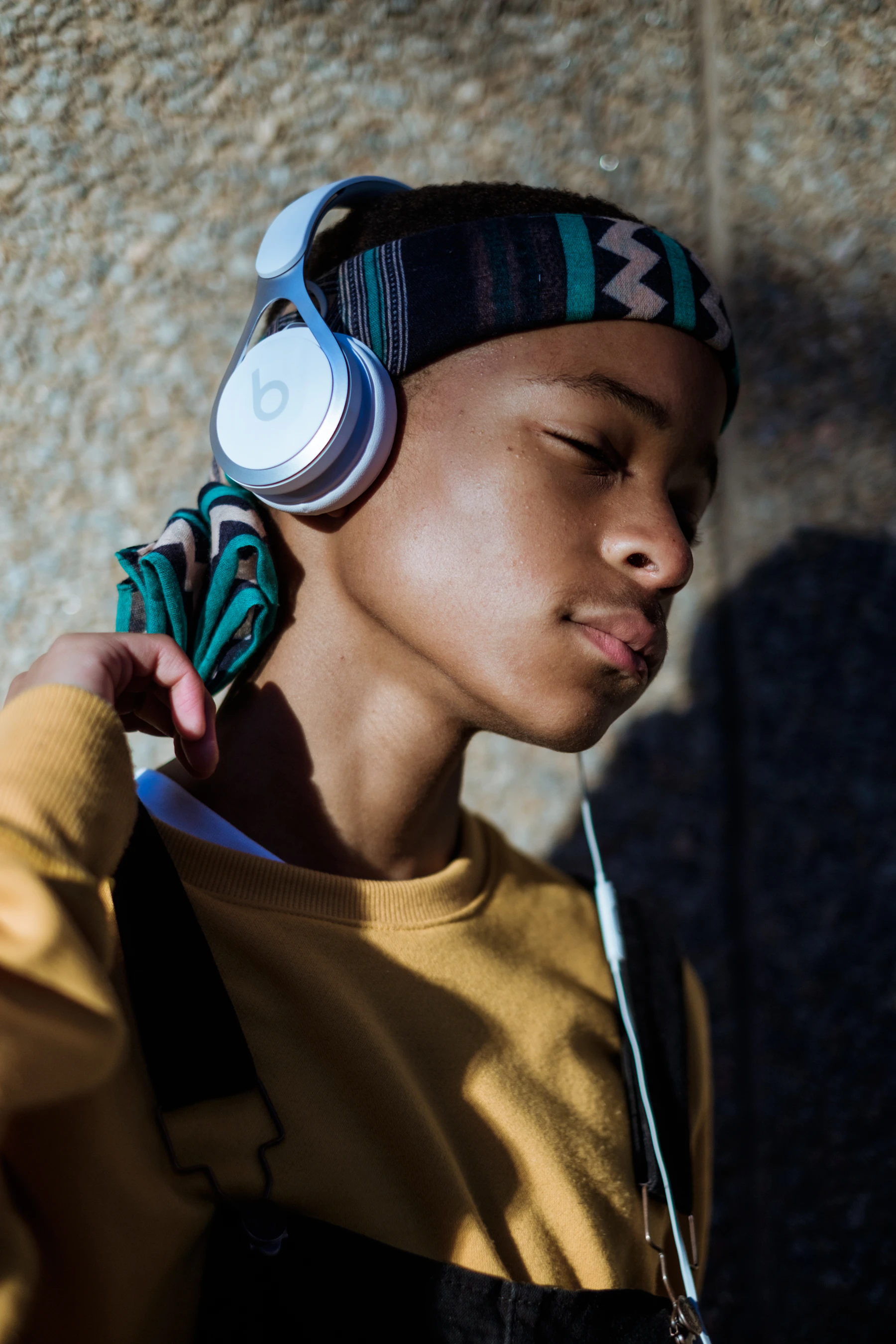 Listener wearing headphones