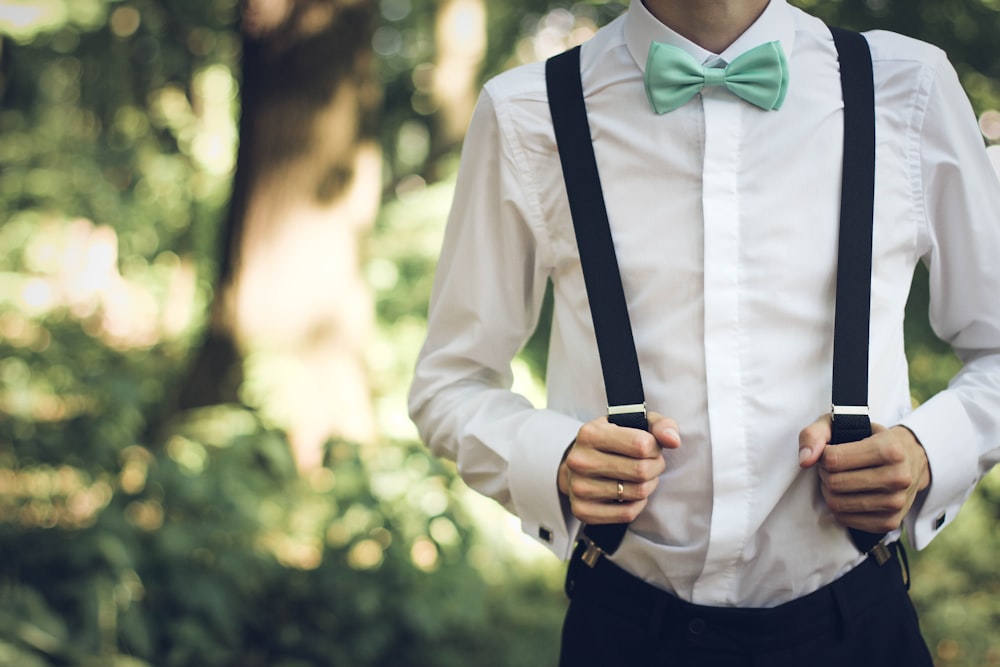 person wearing white dress shirt