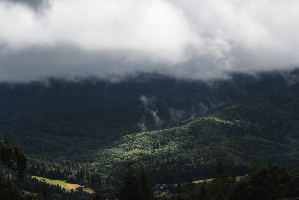 mountain range under stratocumulus clouds