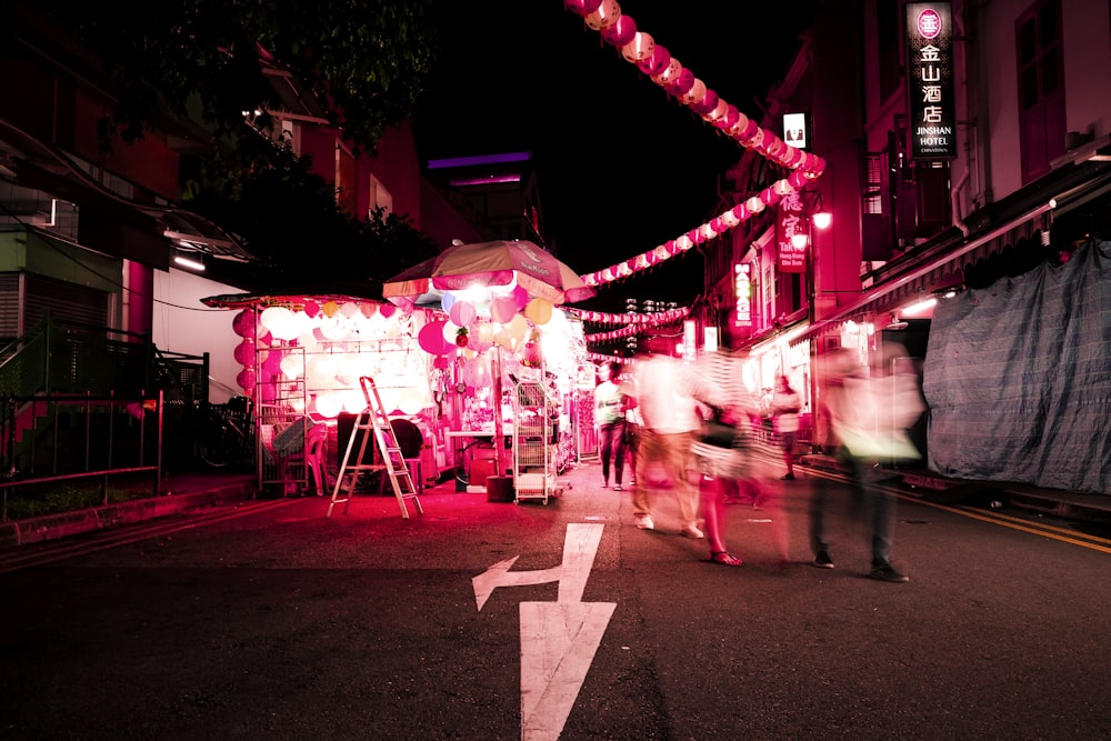 time lapse photography of people walking on street