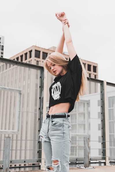 woman stretching her arm upward