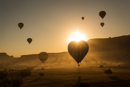 silhouette of hot air balloons in the sky in Göreme Turkey